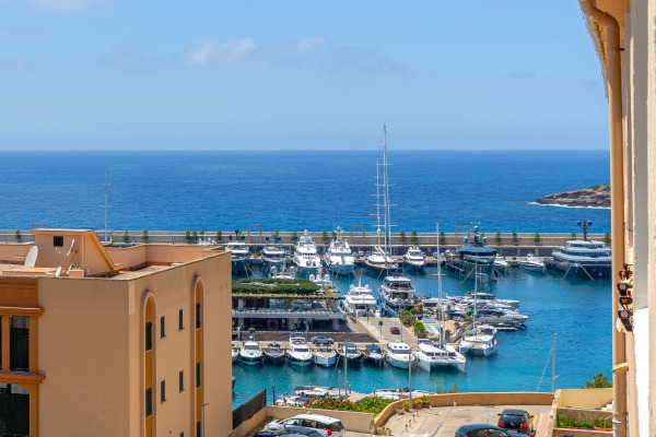 Stylishly renovated upper-floor apartment with partial sea views