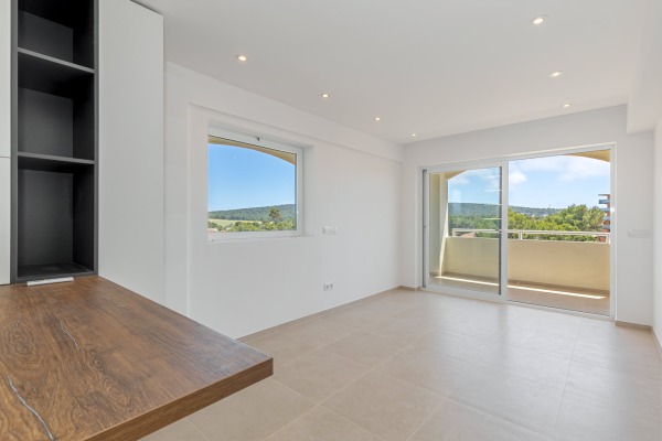 Stylishly renovated upper-floor apartment with partial sea views image 5