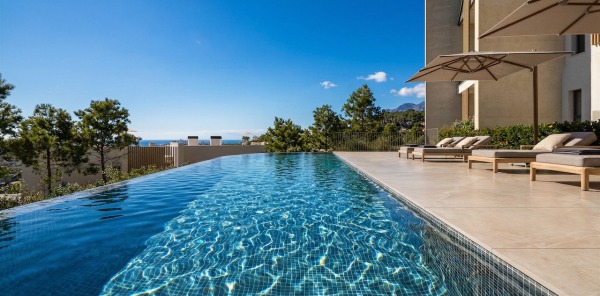 Exclusive new-build ground floor apartment with private garden & sea views image 12