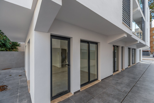 Refurbished apartment building with several apartments and offices image 4