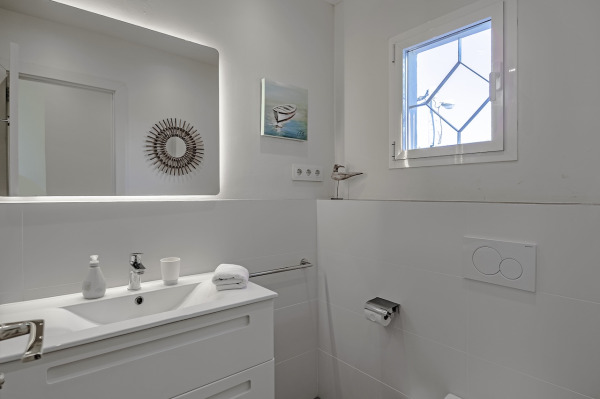 Mediterranean beachfront villa in a unique location above the bay image 11