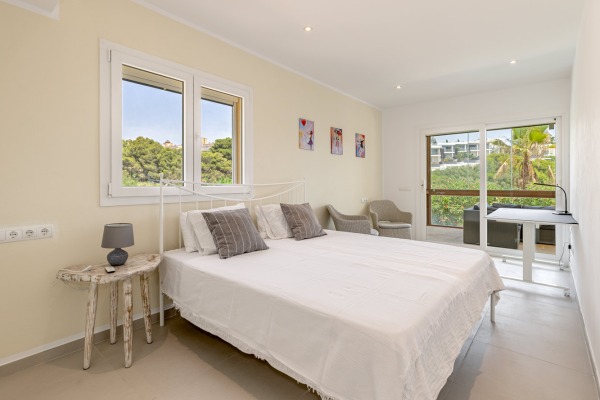 Exclusive villa with direct beach access to Cala Mandía and stunning views image 6