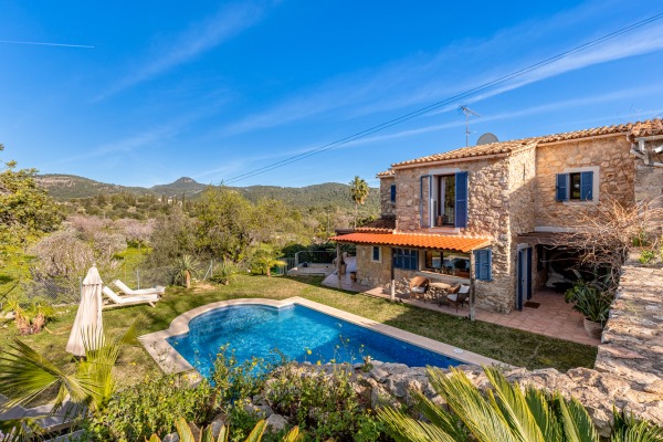 Mediterranean natural stone villa with pool and views of nature in Es Capdella